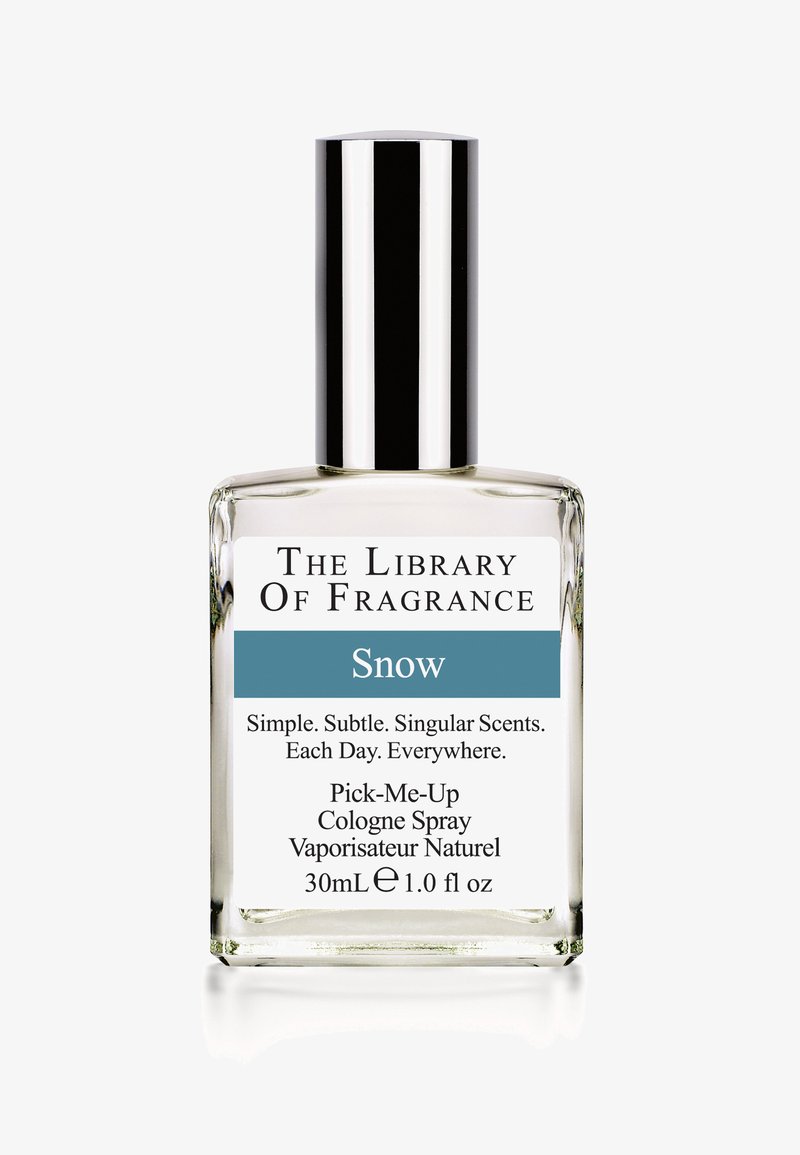 Bottiglia di vetro trasparente con un cappuccio argentato, etichettata "Snow." Contiene 30 mL di spray per colonie. Schema di colori bianco e verde acqua con testo stampato.