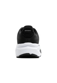 Schwarzer Laufschuh mit einem strukturierten Obermaterial, weißer Zwischensohle und schwarzer Laufsohle. Verfügt über das "BROOKS"-Logo an der Ferse und ein unterstützendes Design.