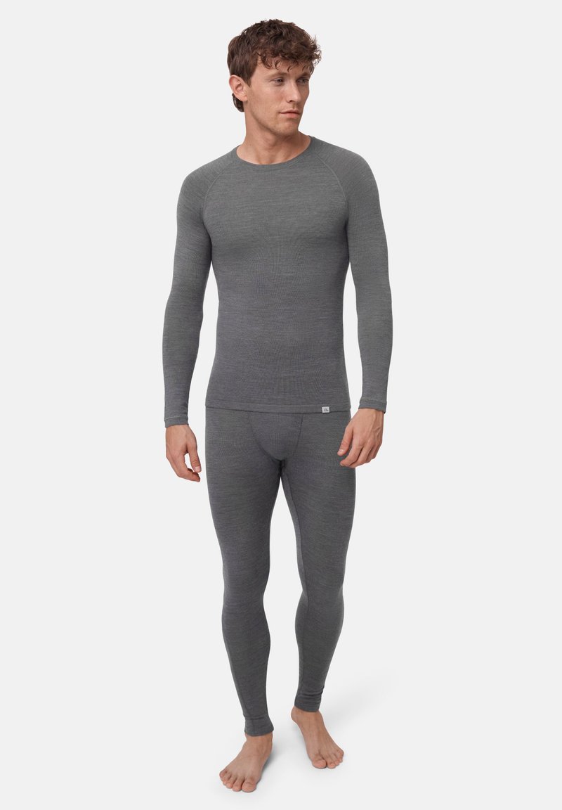 Pitkähihaiset thermopaita ja legginsit tummanharmaasta ribbineuloksesta, joissa on vartalonmyötäinen leikkaus ja saumaton rakenne.