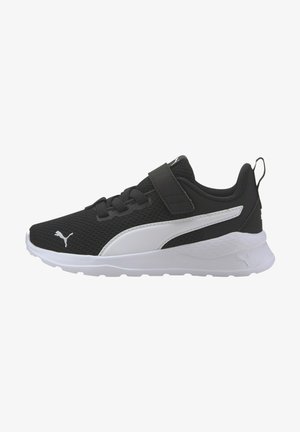 Schwarzer Sportschuh mit Mesh-Obermaterial, weißen Akzenten, einem Klettverschluss und strukturiertem Sohlen. Mit PUMA-Logo an der Seite.