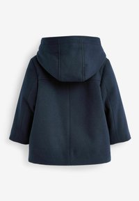 Marineblauwe wollen blendjas met capuchon, brede mouwen en een rechte silhoeet. Heeft naden langs de achterkant en een gladde textuur.