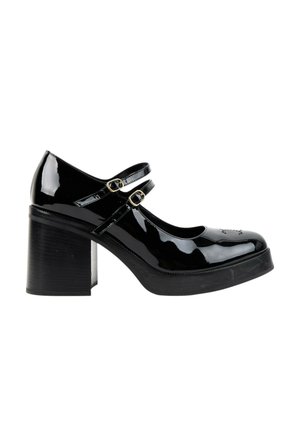 Chaussure Mary Jane en cuir verni noir avec doubles brides à boucle et talon épais, vue de côté sur fond blanc.