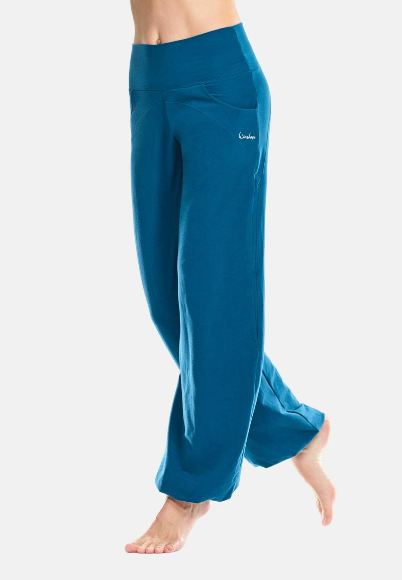 Blue wide-leg pants in a soft, breathable fabric. Features a high waistband and side pockets for practicality.