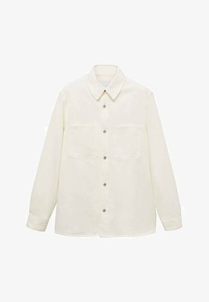 Krämfärgad långärmad skjorta med krag-rynkningsdesign, framknäppning och två bröstfickor. Tillverkad av ett slätt tyg.