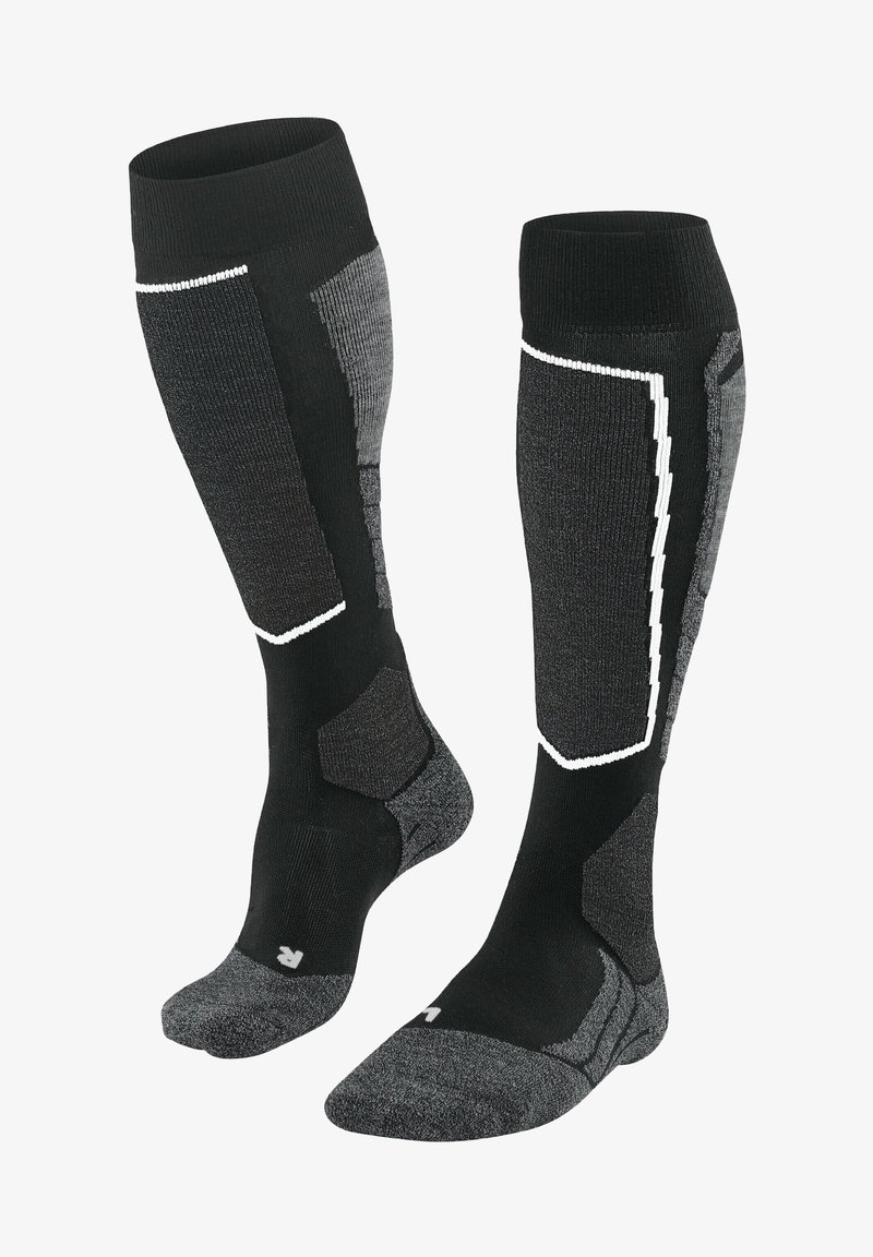 Calze lunghe nere e grigie realizzate in tessuto misto, con una soletta imbottita, bordino a coste e accenti riflettenti in un motivo geometrico.