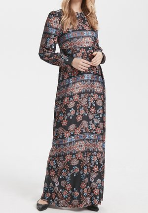 Robes maxi à manches longues en tissu noir avec un motif floral en rouge, bleu et tons terreux, avec des rayures horizontales et un col rond.