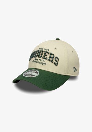 Beige and green baseball cap with "Dodgers" embroidered on front, "Since 1958 West Div. National League," and a New Era logo on the side.