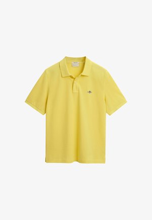 Gelbes Kurzarm-Polohemd aus Baumwolle, mit klassischem Kragen und gesticktem Logo auf der Brust. Glatte Textur, gerader Saum.