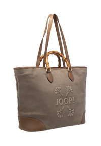 Grande borsa a tracolla in tessuto beige con motivo floreale in rilievo, dettagli in pelle marrone e manico in bambù per una presa comoda. Cinghie regolabili.