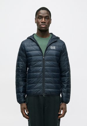 TRAIN CORE JACKET - Gewatteerde jas - blue