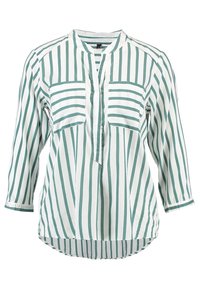 Blusa a righe verdi e bianche con colletto alla mandarino, maniche a tre quarti e due tasche sul petto. Tessuto liscio con taglio morbido.
