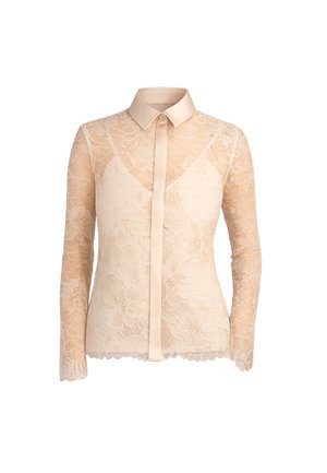 Blusa beige in pizzo floreale a maniche lunghe con colletto tinta unita, pattina con bottoni e fodera interna stile sottoveste sulla parte superiore del petto.