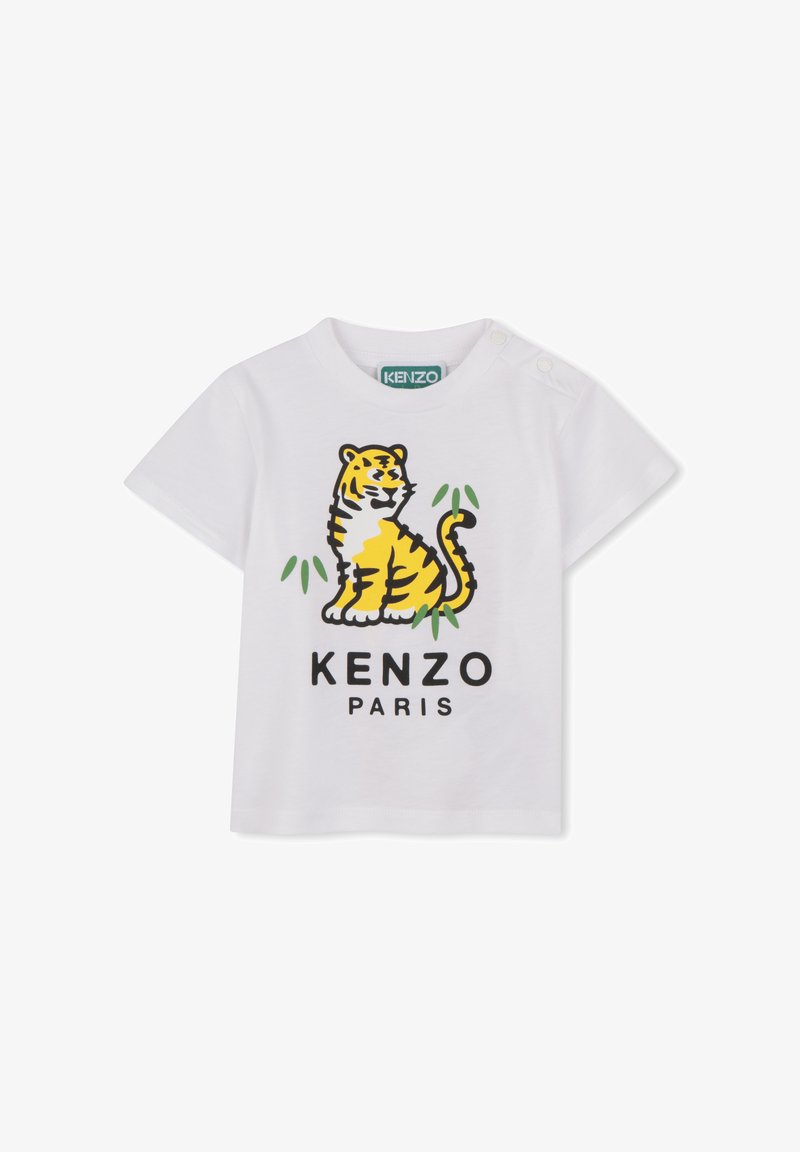 T-shirt en coton blanc avec un motif tigre coloré et le texte « KENZO PARIS » en lettres noires audacieuses. Col rond avec boutons-pression.