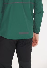 Endurance HUGOEE - Löparjacka - sea moss
