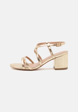 Klassieke pumps - gold