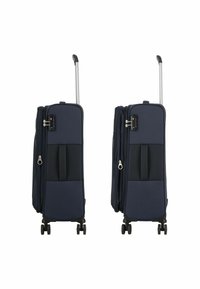Valigia blu navy con design rigido, manico telescopico silver e quattro ruote nere. Dotata di cerniere e tasche laterali.