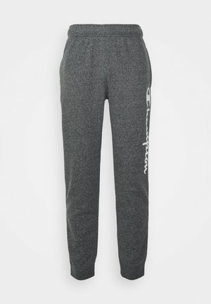 Pantalones deportivos gris oscuro con cintura y puños elásticos, con el logo vertical blanco "Champion" en la pierna izquierda.
