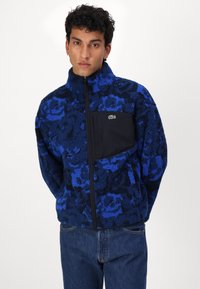 Lacoste Mezisezónní bunda  - globe/navy blue/lazuli