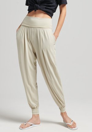STUDIO HAREEM - Tracksuit bottoms - pelican