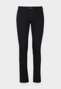 Fekete slim fit farmernadrág sima textúrájú denim anyagból. Öt zsebből áll, cipzárral és gombos derékrésszel rendelkezik.