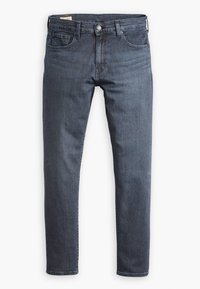 Miestne tmavomodré slim fit rifle s predným gombíkom a zipsom, piatimi vreckami a pútkom na opasok.