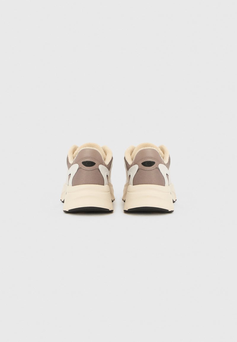 Lightweight sneakers in beige and brown, featuring a mesh upper, padded collar, and contrasting white accents. Black rubber sole.