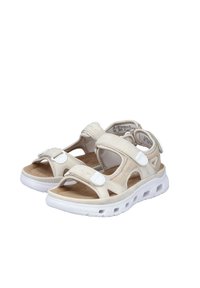 Beige open-toe sandals with adjustable white straps, cushioned footbed, and textured rubber sole featuring ventilation holes.