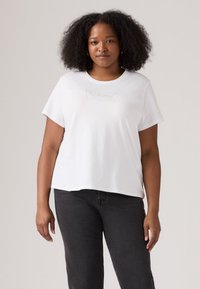 White short-sleeve t-shirt with a round neckline, featuring a decorative logo in gray on the front. The fabric appears soft and lightweight.