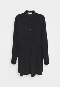 Camicia nera a maniche lunghe con chiusura a bottoni, colletto e vita arricciata. Realizzata in un tessuto leggero e morbido.