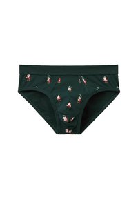 Gröna bomullstrosor med spridda tryck av röda och vita tomtar, en tajt passform och en mjuk elastisk midjeband för komfort.