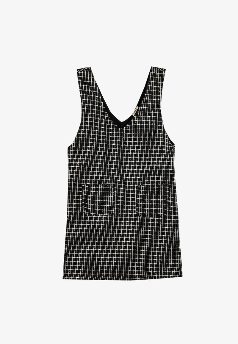 Zwart-wit geruite mouwloze top met een V-hals en twee voorzakken. Gemaakt van stof met een gemêleerde afwerking.