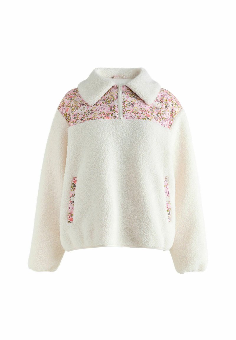 Pulover din fleece crem cu yoke, guler și fermoar cu model floral roz. Dispune de două buzunare laterale cu accente florale.