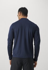 Nike Performance PACER granatowy
