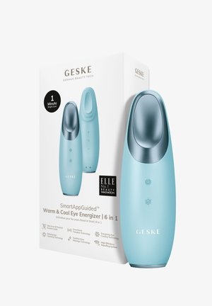 Lichtblauwe ergonomische oogoogener met een ronde bovenkant, metallic accenten en bedieningsknoppen. Verpakking benadrukt functies en merknnaam.