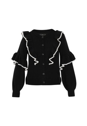 Schwarze Strickjacke mit Rüschenschläfen und Frontdetails. Mit weißem Saum um die Rüschen und einer Knopföffnung. Weicher, strukturiertes Material.