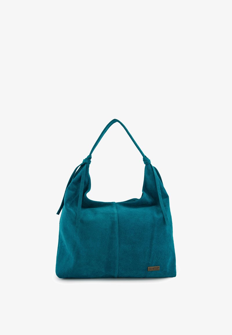 Teal suède handtas met een slouchy vorm, dubbele geknoopte handvatten en een subtiele logodetail. Zachte textuur en ruim ontwerp.
