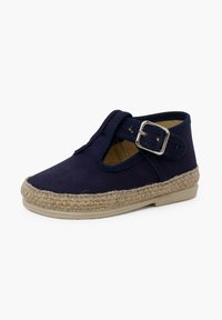 Navy textile shoe with a rounded toe, jute trim outsole, and a side buckle closure. Canvas upper, lightweight design, and breathable interior.