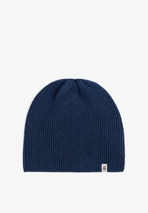 Navy blue knitted beanie hat with a ribbed texture, featuring a small white logo label on the side. Soft, stretchable fabric, rounded shape.
