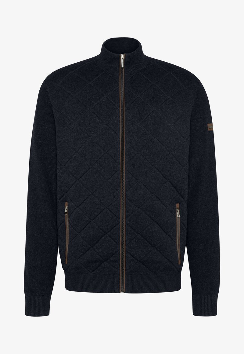 Gep quiltete marineblaue Sweatjacke mit hohem Kragen, zwei mit Reißverschluss gesicherten Fronttaschen und gerippten Bündchen sowie Saum. Mit braunen Reißverschlussakzenten.