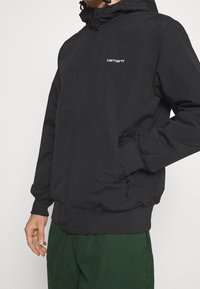 Carhartt WIP Mezisezónní bunda  - black
