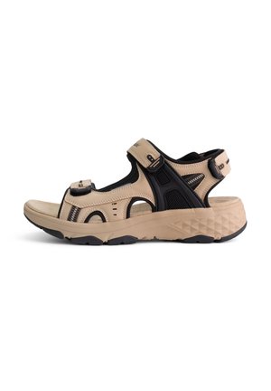 Beige en zwarte outdoor sandalen met een bovenwerk van gaas en synthetisch materiaal, verstelbare banden en een gestructureerde rubberen zool. Voorzien van ventilatieopeningen.