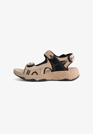 Beige en zwarte outdoor sandalen met een bovenwerk van gaas en synthetisch materiaal, verstelbare banden en een gestructureerde rubberen zool. Voorzien van ventilatieopeningen.