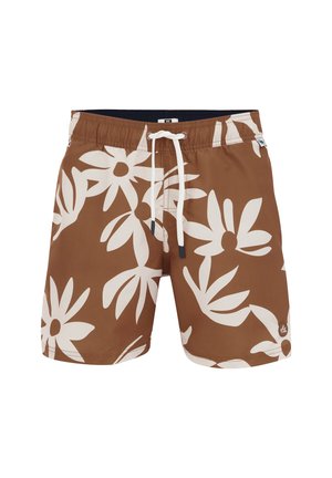 Bruna badshorts med stora vita blommönster, elastisk midja med dragsko och en liten logotypdetalj nära fållen.
