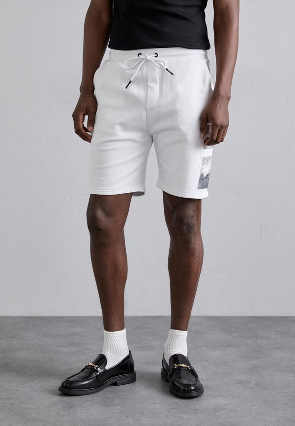 BERMUDA - Tracksuit bottoms - bianco ottico