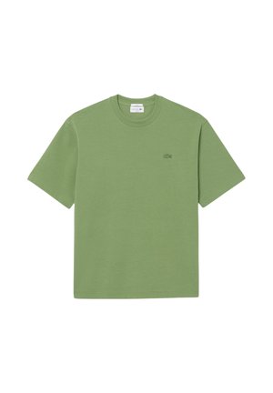 T-shirt verde a manica corta con scollo rotondo, piccolo logo ricamato sul lato sinistro del petto e dettaglio di orlo cucito.