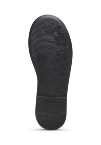 Suola in gomma nera con motivi floreali, grip testurizzato e tacco arrotondato. Include dettagli del marchio vicino al fondo.