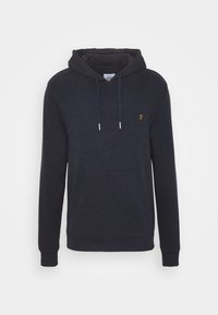 Sweatshirt à capuche bleu marine en tissu au toucher lisse ; il dispose d'une poche avant, de cordons de serrage et d'un petit logo sur la poitrine.