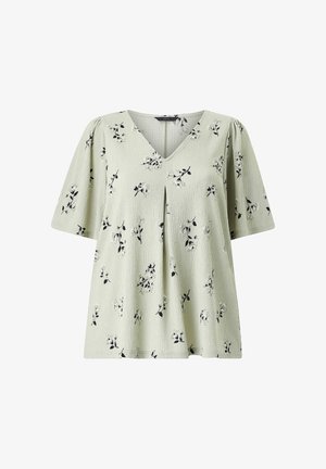 Lysegrøn kortærmet bluse med sort og hvidt blomstermønster, V-hals og frontplissé-detalje.