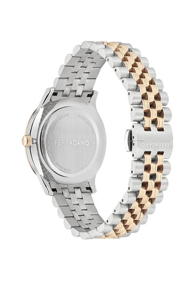 Stainless steel watch with a two-tone metal band, featuring matte and polished finishes, and a round case displaying clean lines and no embellishments.