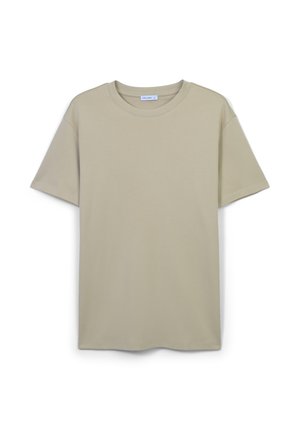 T-shirt court beige clair à manches courtes fabriqué en coton doux, avec un col rond et une coupe droite sans motifs distincts.